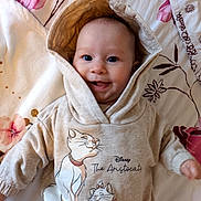 Lily-Rose participe au concours pour gagner de l'argent avec cette photo : aristocats, baby, blanket, blue_eyes, child, clothing, cute, disney, face, floral, happy, hood, hoodie, infant, lying_down, pattern, person, sleeve, smile, soft