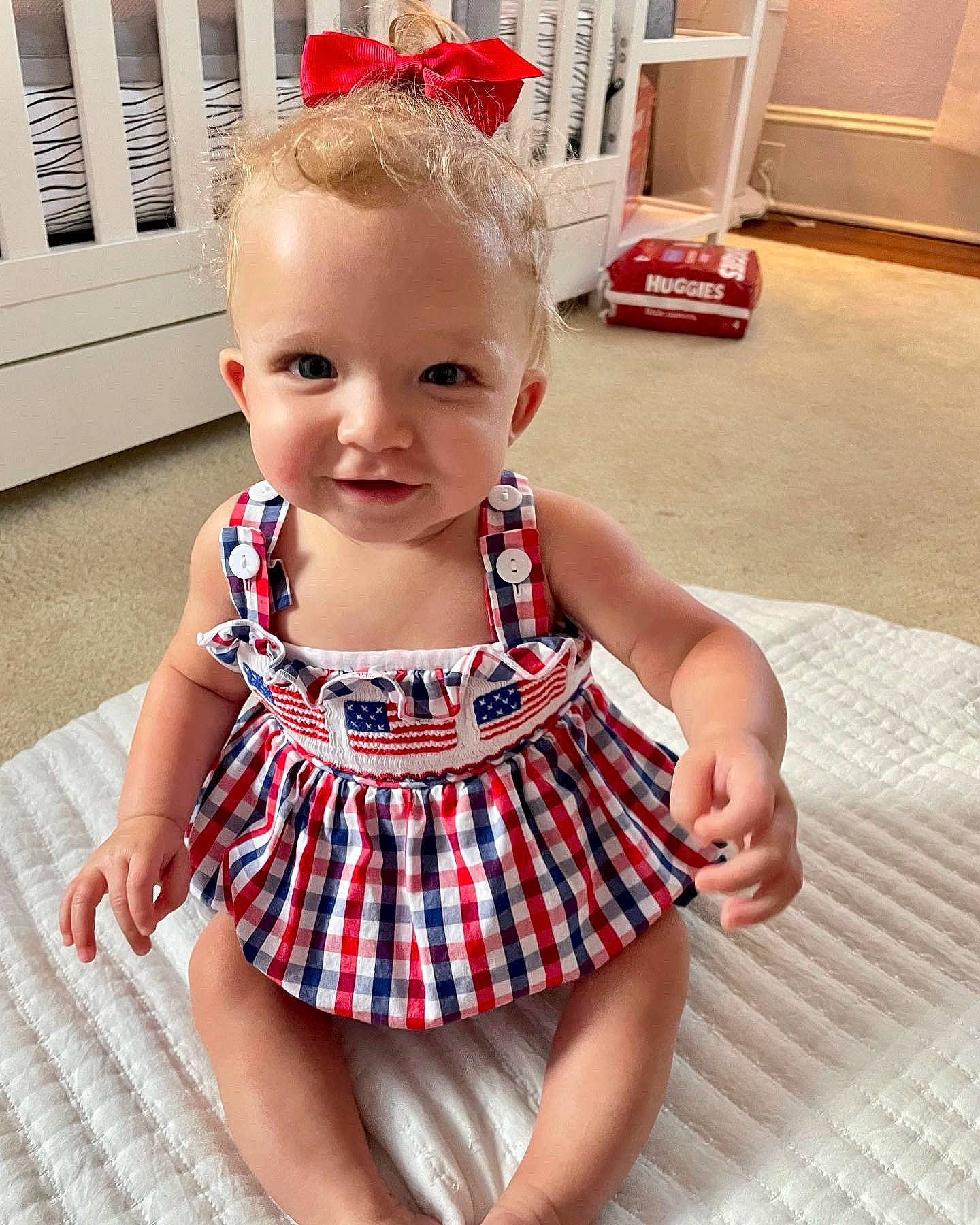 Andi is registered to the contest to win money with this photo: baby, baby_toddler_clothing, child, day_dress, dress, face, happy, head, iris, neck, one_piece_garment, pattern, person, pink, shoulder, skin, sleeve, sleeveless_shirt, smile, toddler