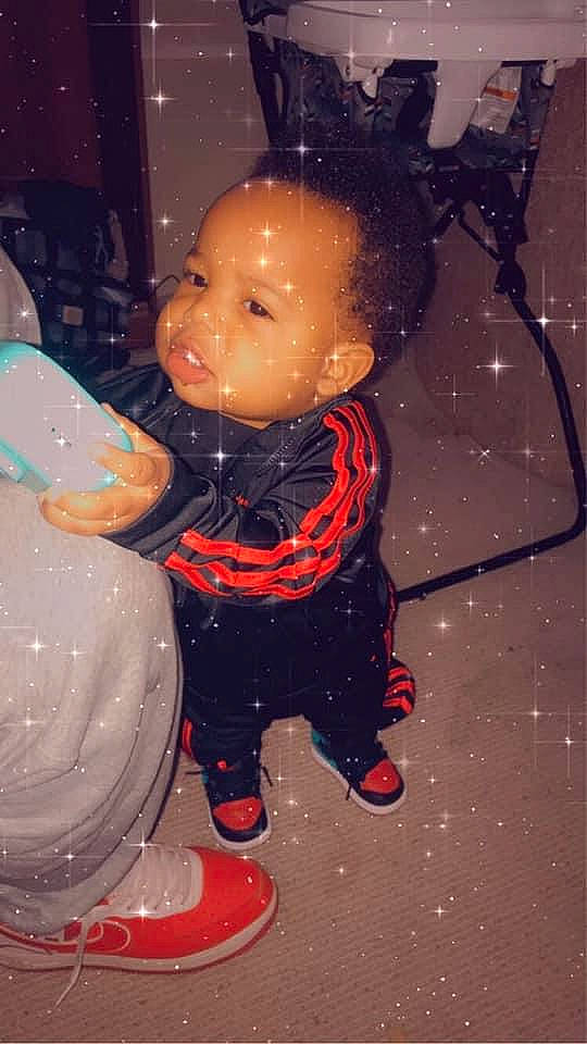 Nassir joined the competition — help win amazing prizes! baby, cheek, child, head, person, smile, toddler, toy