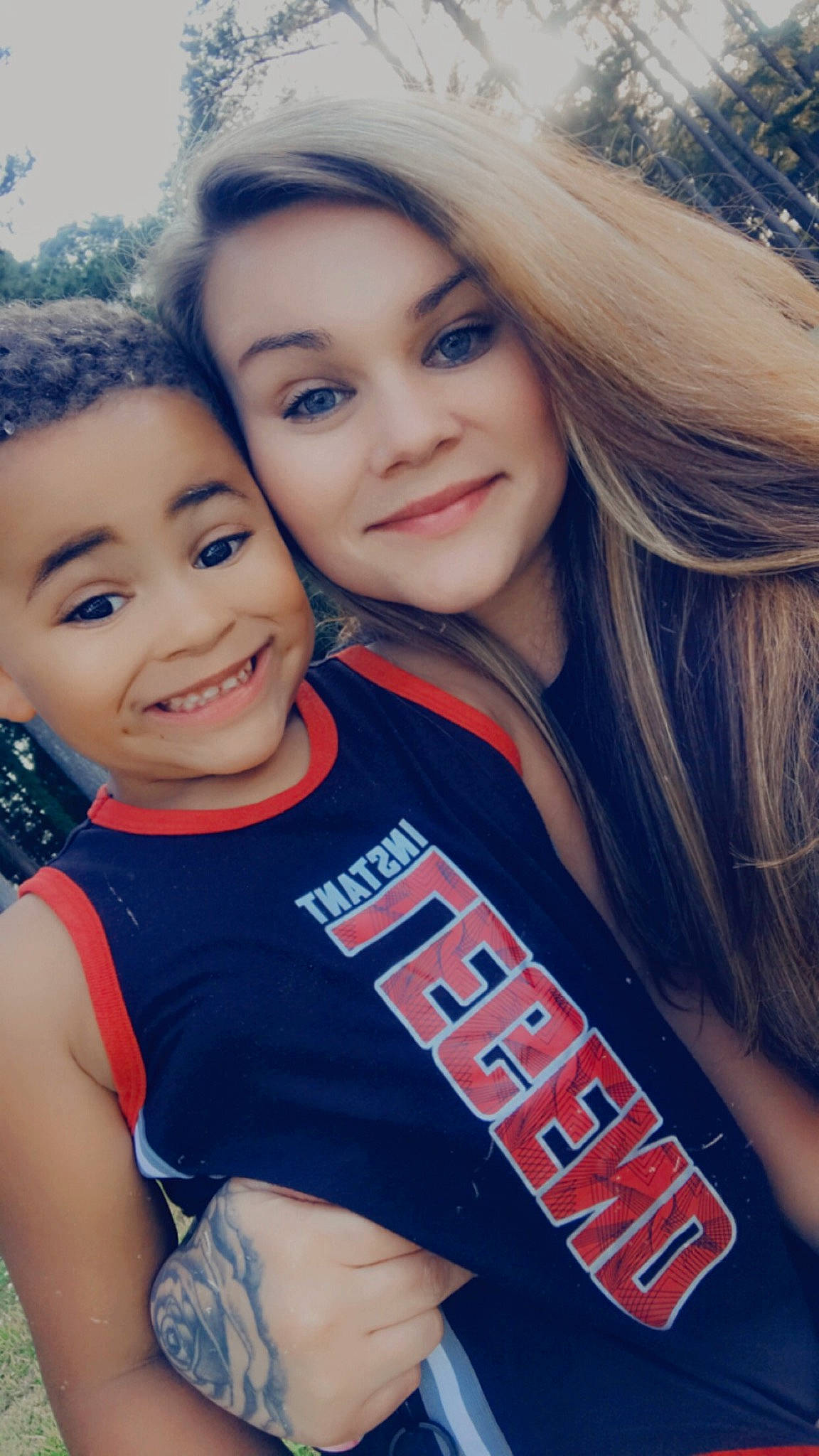 Trayvan is registered to the contest to win money with this photo: child, chin, cool, eye, face, facial_expression, flash_photography, fun, grass, hair, happy, head, iris, joy, leisure, lip, people_in_nature, person, skin, smile