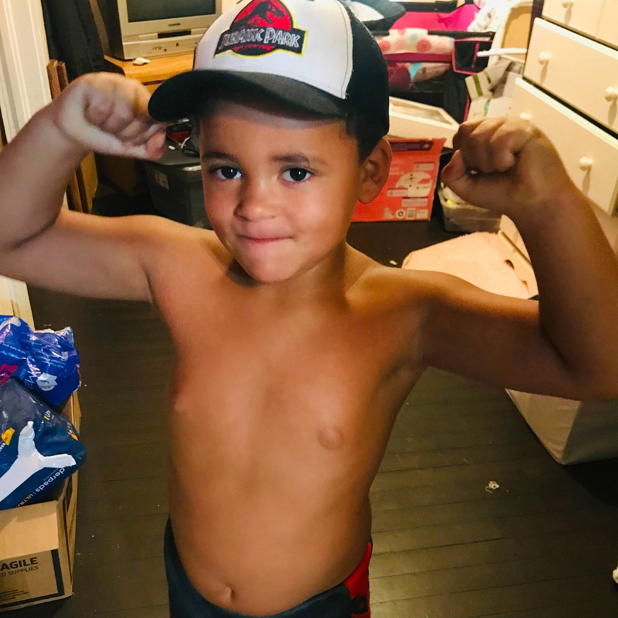 Trayvan joined the competition — help win amazing prizes! barechested, baseball_cap, cap, chest, cool, elbow, finger, fun, gesture, happy, headwear, joint, joy, muscle, neck, person, shoulder, smile, t_shirt, thumb