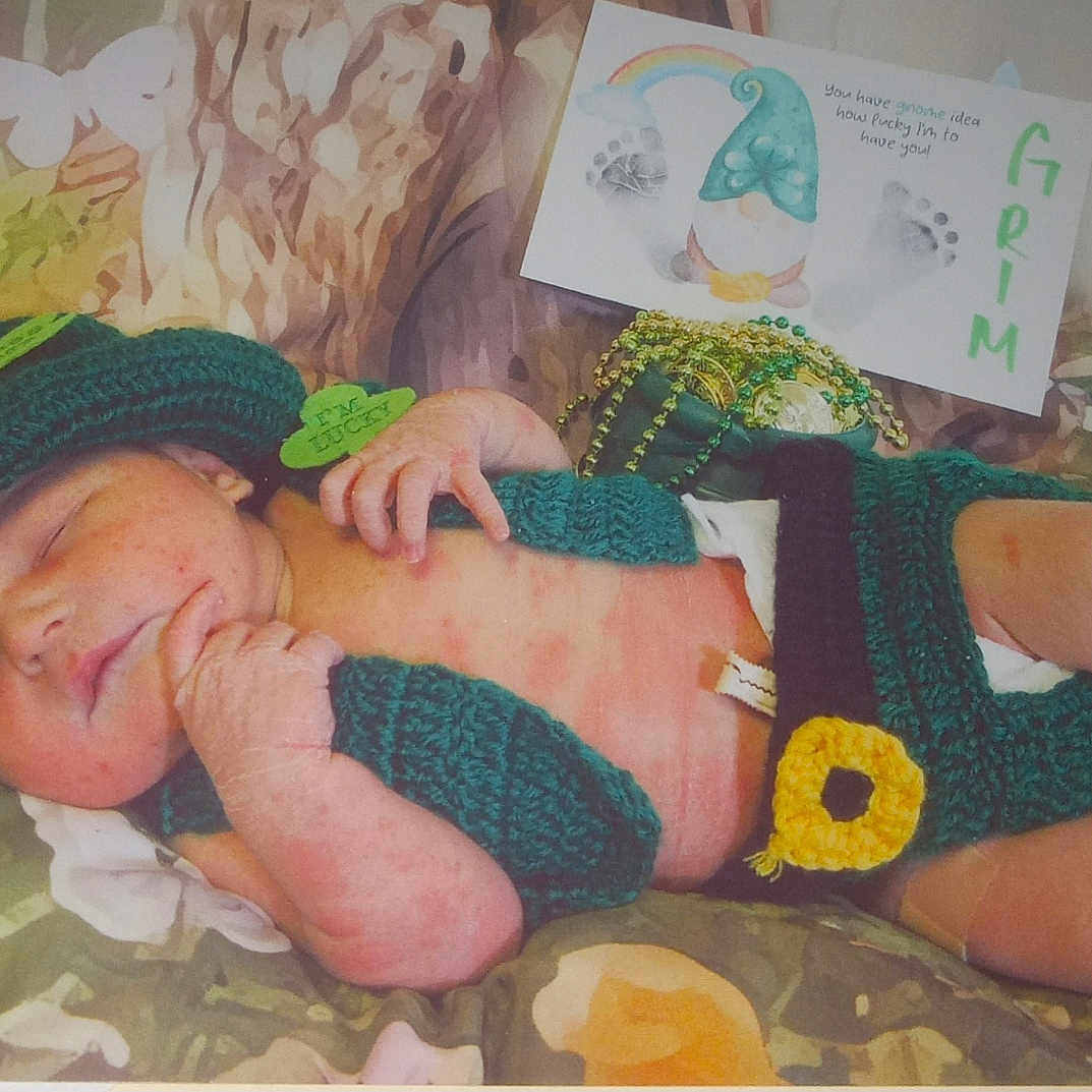 Grim joined the competition — help win amazing prizes! architecture, baby, bodypart, bonnet, building, cap, clothing, face, finger, furniture, glove, hand, hat, head, hospital, newborn, person, photography, portrait, sleeping