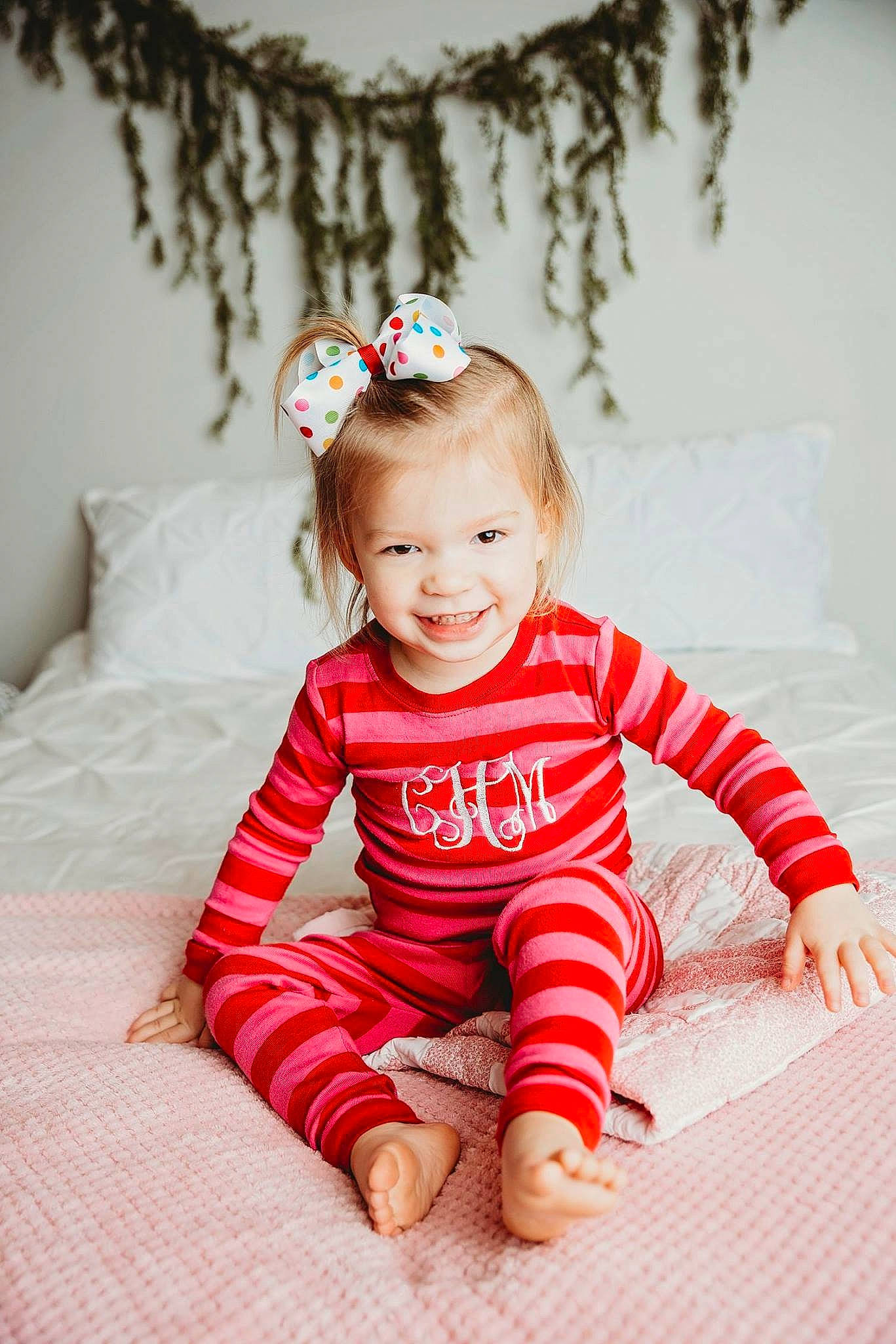 Collins is registered to the contest to win money with this photo: child, child_model, girl, hair_accessory, happiness, infant, joy, pattern, person, product, red, skin, smile, textile, toddler