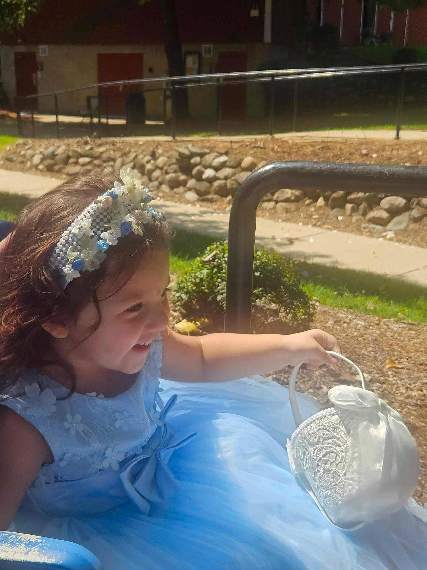 Katianna joined the competition — help win amazing prizes! baby_toddler_clothing, child, eyewear, fun, garden, grass, happy, headpiece, human_leg, lawn, leisure, light, person, personal_protective_equipment, plant, recreation, sitting, toddler, tree, vacation