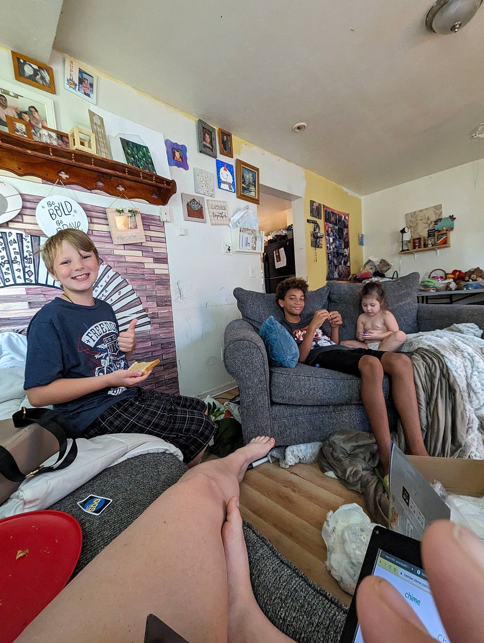 Dominic joined the competition — help win amazing prizes! comfort, couch, event, eyewear, fun, furniture, human_leg, interior_design, joy, knee, lamp, lap, leisure, living_room, person, picture_frame, room, shorts, sitting, smile