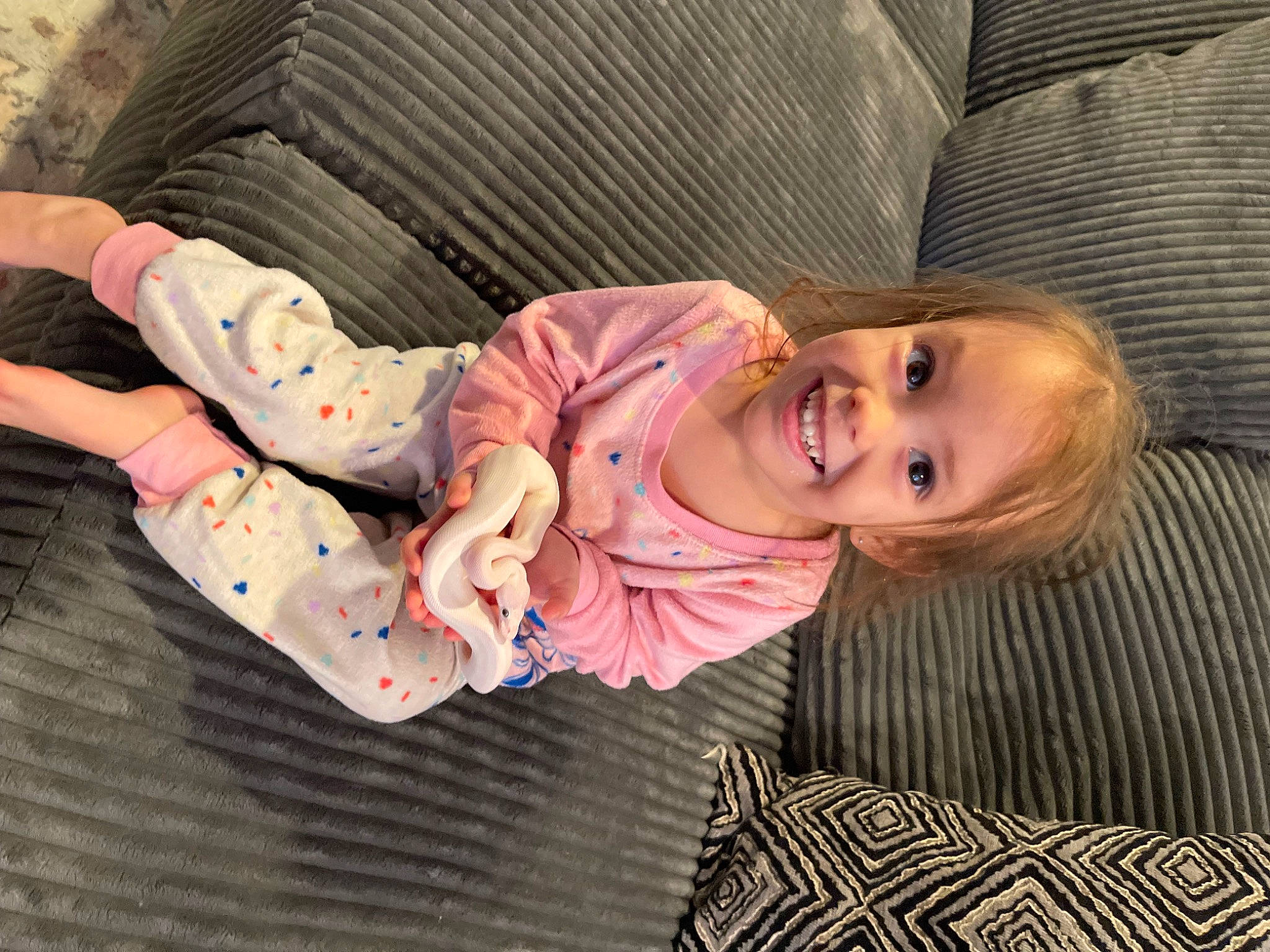Olive joined the competition — help win amazing prizes! baby, baby_laughing, baby_products, baby_toddler_clothing, cheek, child, comfort, eye, flooring, fun, happy, joy, linens, pattern, person, room, sitting, skin, sleeve, smile