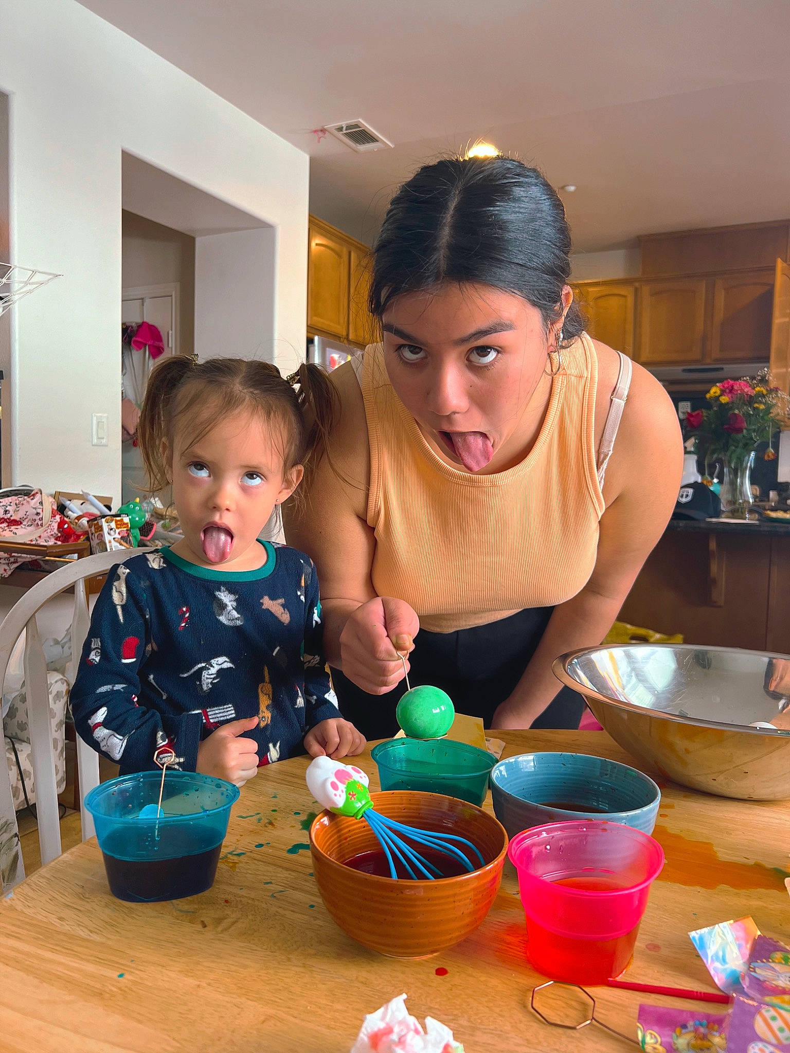 Olive is registered to the contest to win money with this photo: baby, bowl, chair, child, cooking, cookware_and_bakeware, countertop, drinkware, event, fun, homemaker, kitchen, mixing_bowl, paint, person, pottery, room, serveware, surprise, table