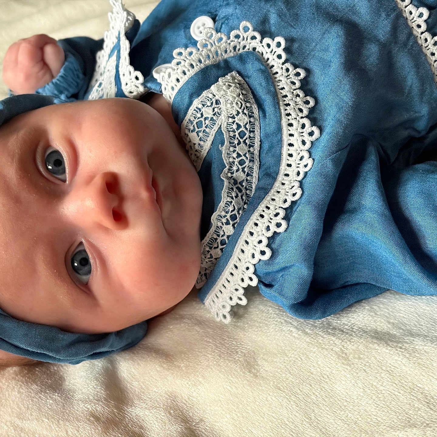 Brielle joined the competition — help win amazing prizes! baby, infant, blue_clothing, headband, lace, close_up, portrait, soft_texture, blanket, sleepwear, cute, child, newborn, resting, indoors, face, expression, peaceful, adorable, human