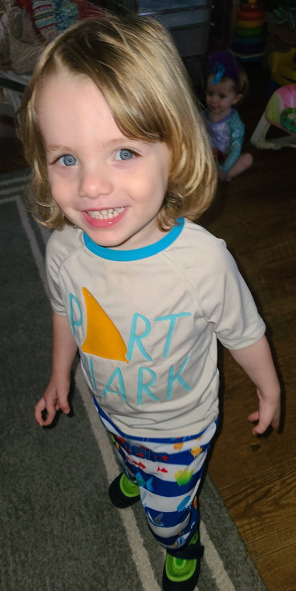 Thomas is registered to the contest to win money with this photo: arm, baby_toddler_clothing, cheek, chin, eye, face, facial_expression, hair, happy, head, iris, joint, joy, mouth, organ, person, skin, sleeve, smile, standing