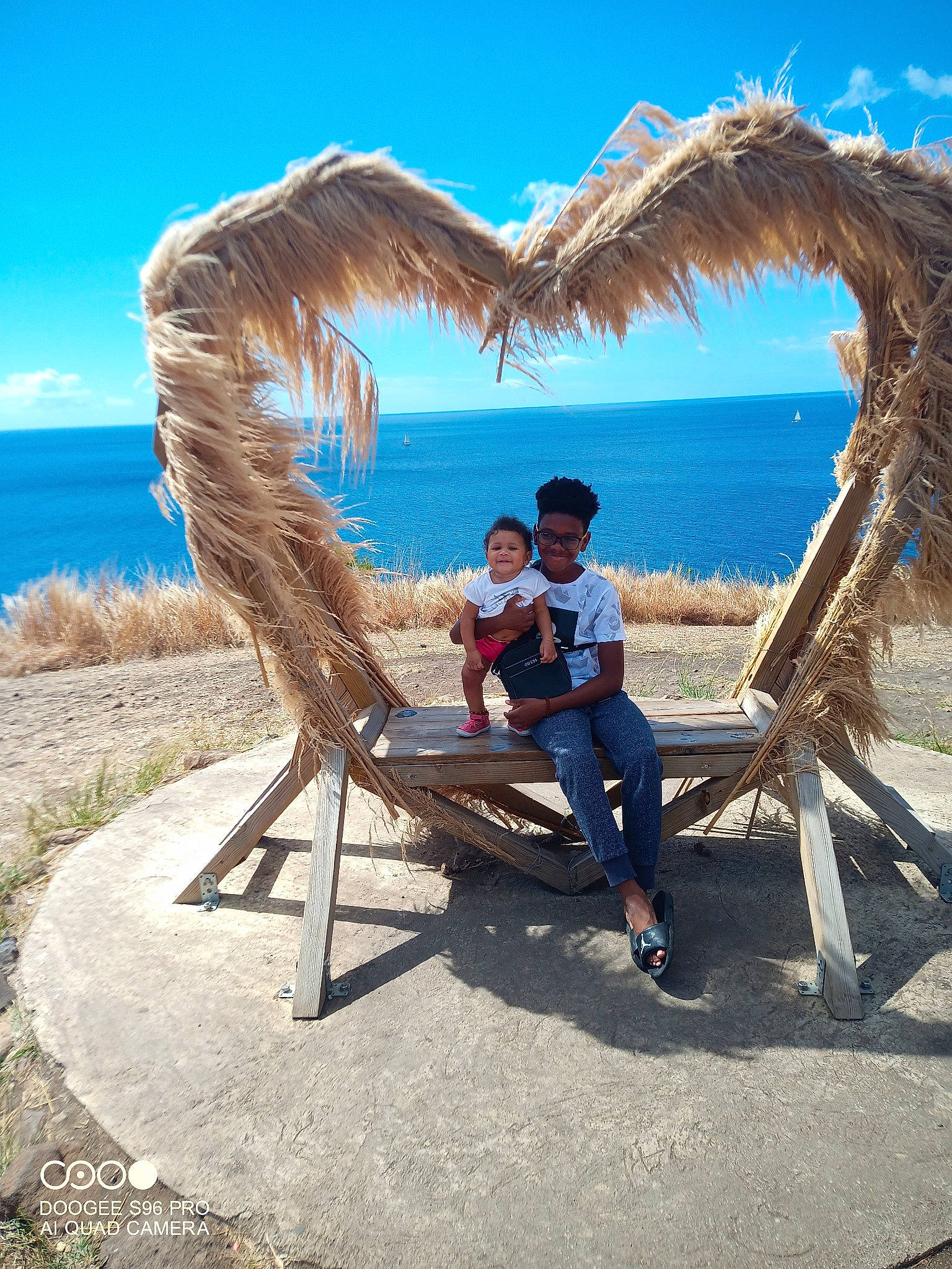 Deylani a rejoint le concours — aidez-le/la à gagner de superbes lots ! azure, beach, chair, cloud, dress, fun, grass, happy, joy, lake, landscape, leisure, outdoor_furniture, people_in_nature, person, plant, sky, sunlounger, travel, tree