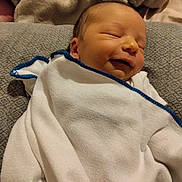 Jaxson joined the competition — help win amazing prizes! newborn, baby, blanket, sleeping, smiling, face, child, infant, soft, cozy, pillow, pattern, bed, resting, wrapped, cute, peaceful, indoors, fabric, comfort