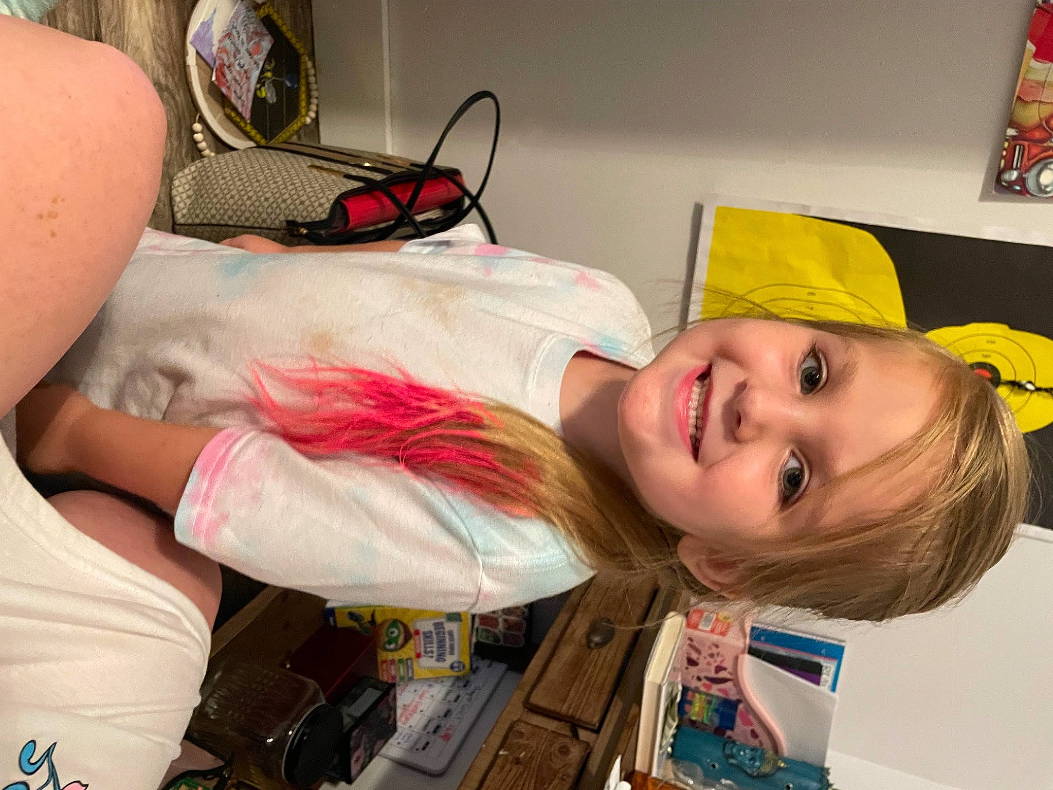 Ophelia is registered to the contest to win money with this photo: abdomen, chest, child, comfort, elbow, flesh, fun, happy, human_leg, joy, knee, mouth, organ, person, picture_frame, room, smile, thigh, toddler, white