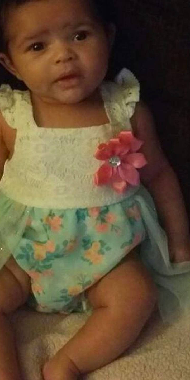 Kiana is registered to the contest to win money with this photo: baby, cheek, child, flower, person, skin, smile, toddler