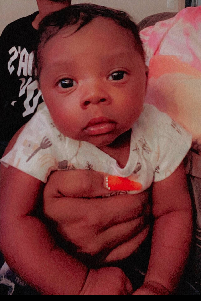 Khasius is registered to the contest to win money with this photo: arm, baby, baby_toddler_clothing, cheek, cool, ear, eyebrow, eyelash, finger, gesture, hand, happy, iris, lip, mouth, neck, nose, person, pink, skin