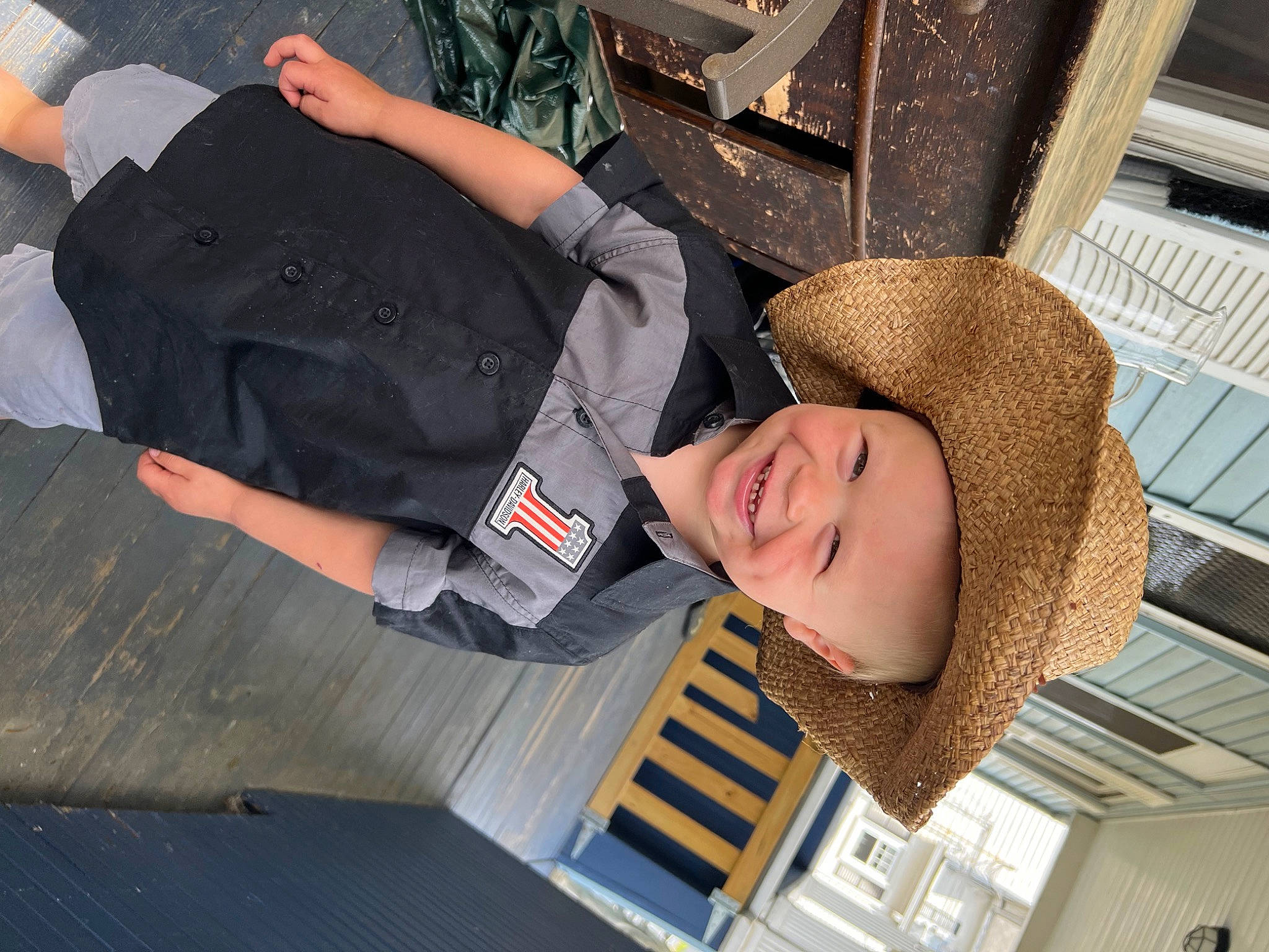Cayson joined the competition — help win amazing prizes! child, elbow, fun, gesture, happy, hat, headwear, human_leg, joy, leisure, person, smile, street_fashion, sun_hat, t_shirt, thigh, toddler, vacation, wood, wrist