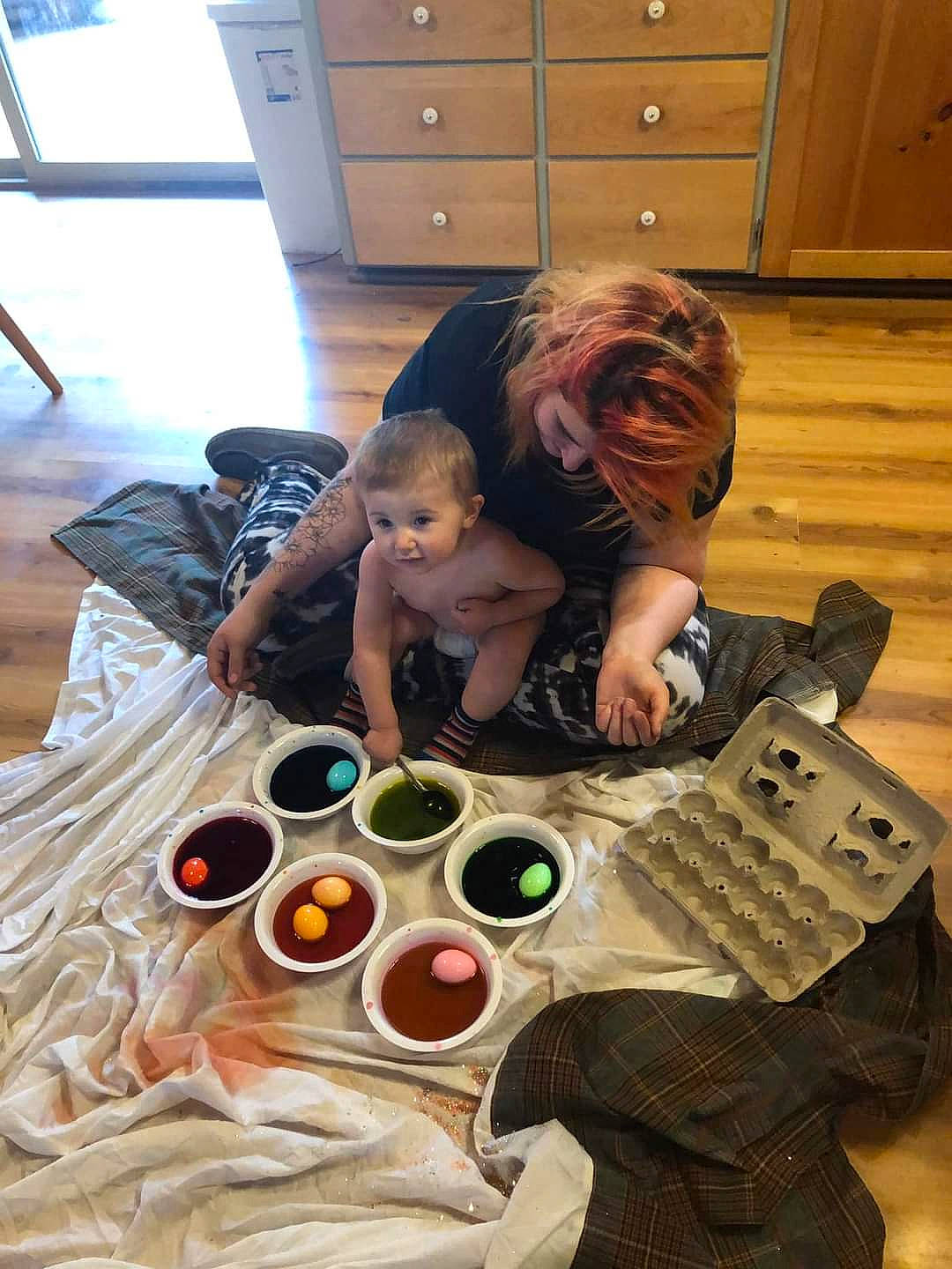 Bryce joined the competition — help win amazing prizes! cabinetry, chest, chest_of_drawers, cupboard, drawer, dresser, event, eyewear, flooring, fun, hardwood, kitchen, leisure, person, room, sitting, sunglasses, t_shirt, toddler, wood