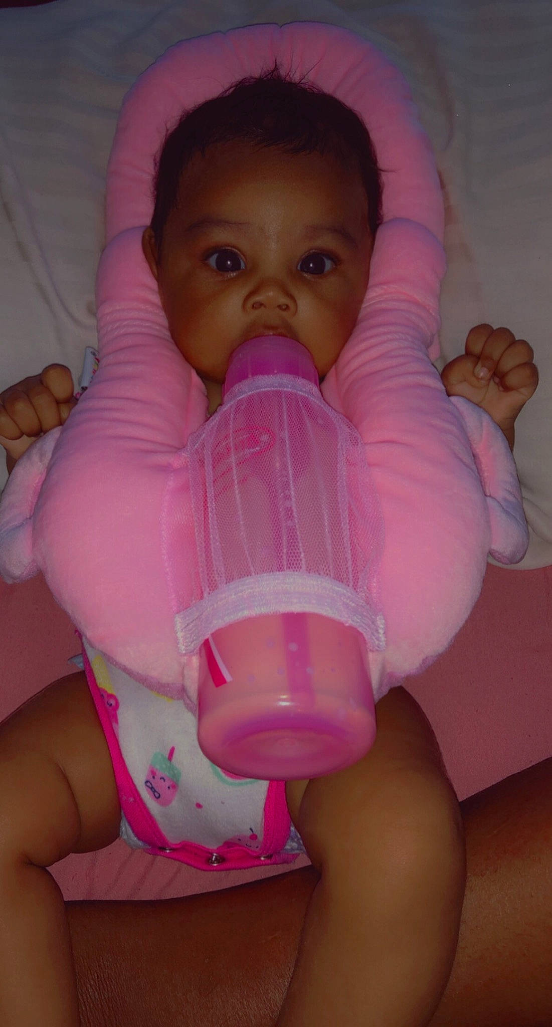 Aiyanna is registered to the contest to win money with this photo: baby, baby_products, baby_toddler_clothing, cheek, chest, child, comfort, drinkware, eyelash, finger, head, human_body, human_leg, mouth, nail, person, pink, skin, thigh, thumb