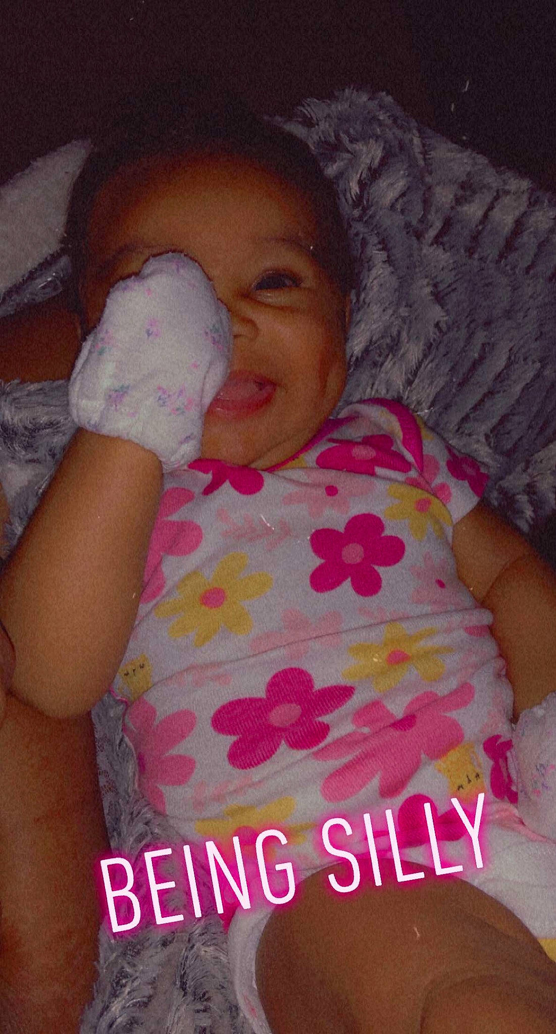 Aiyanna joined the competition — help win amazing prizes! arm, baby, bed, cheek, comfort, face, finger, happy, human_body, mouth, muscle, nose, organ, person, pink, skin, smile, t_shirt, textile, thumb