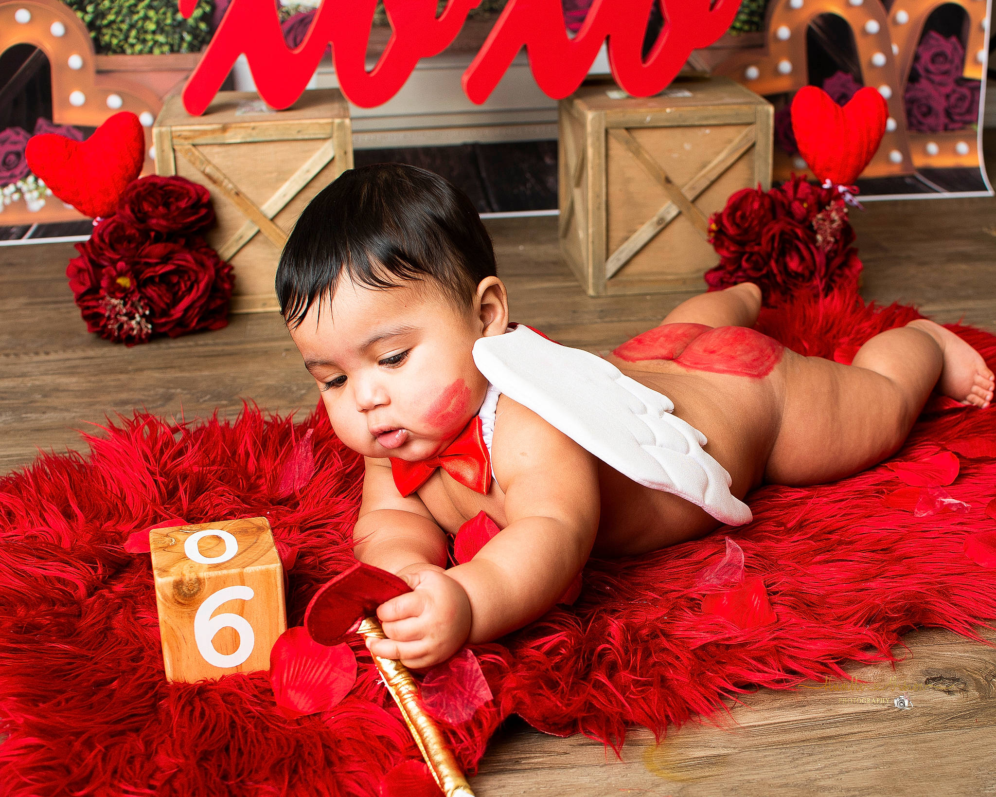 Izaiah joined the competition — help win amazing prizes! baby, baby_toddler_clothing, beauty, child, christmas, design, event, fashion, flooring, fun, happy, holiday, human, leisure, orange, person, pink, red, textile, thigh