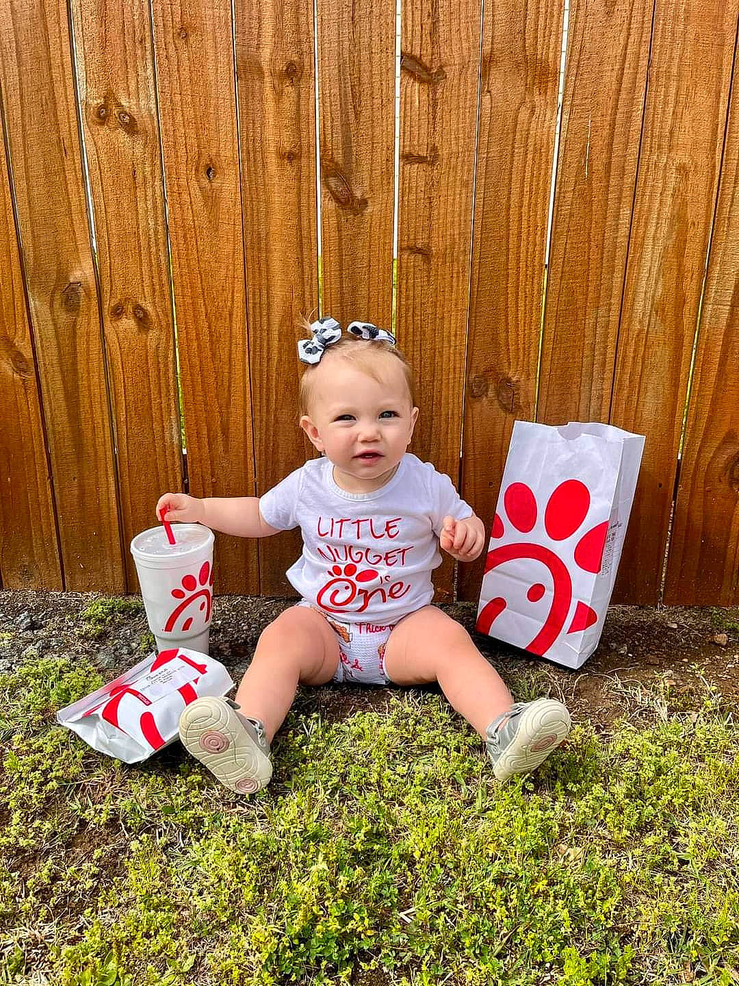 Treva is registered to the contest to win money with this photo: baby, baby_toddler_clothing, child, fun, goggles, grass, happy, hat, holiday, knee, lawn, leisure, people_in_nature, person, plant, play, recreation, shorts, sitting, toddler