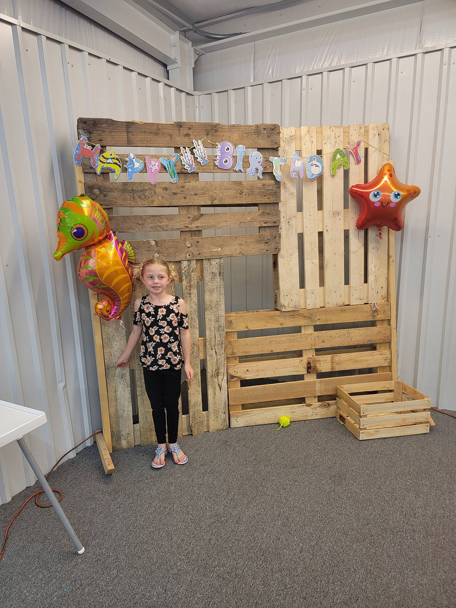 Abby is registered to the contest to win money with this photo: art, child, event, flooring, fun, hardwood, joy, leisure, person, play, room, sandal, shorts, smile, t_shirt, toddler, visual_arts, wood
