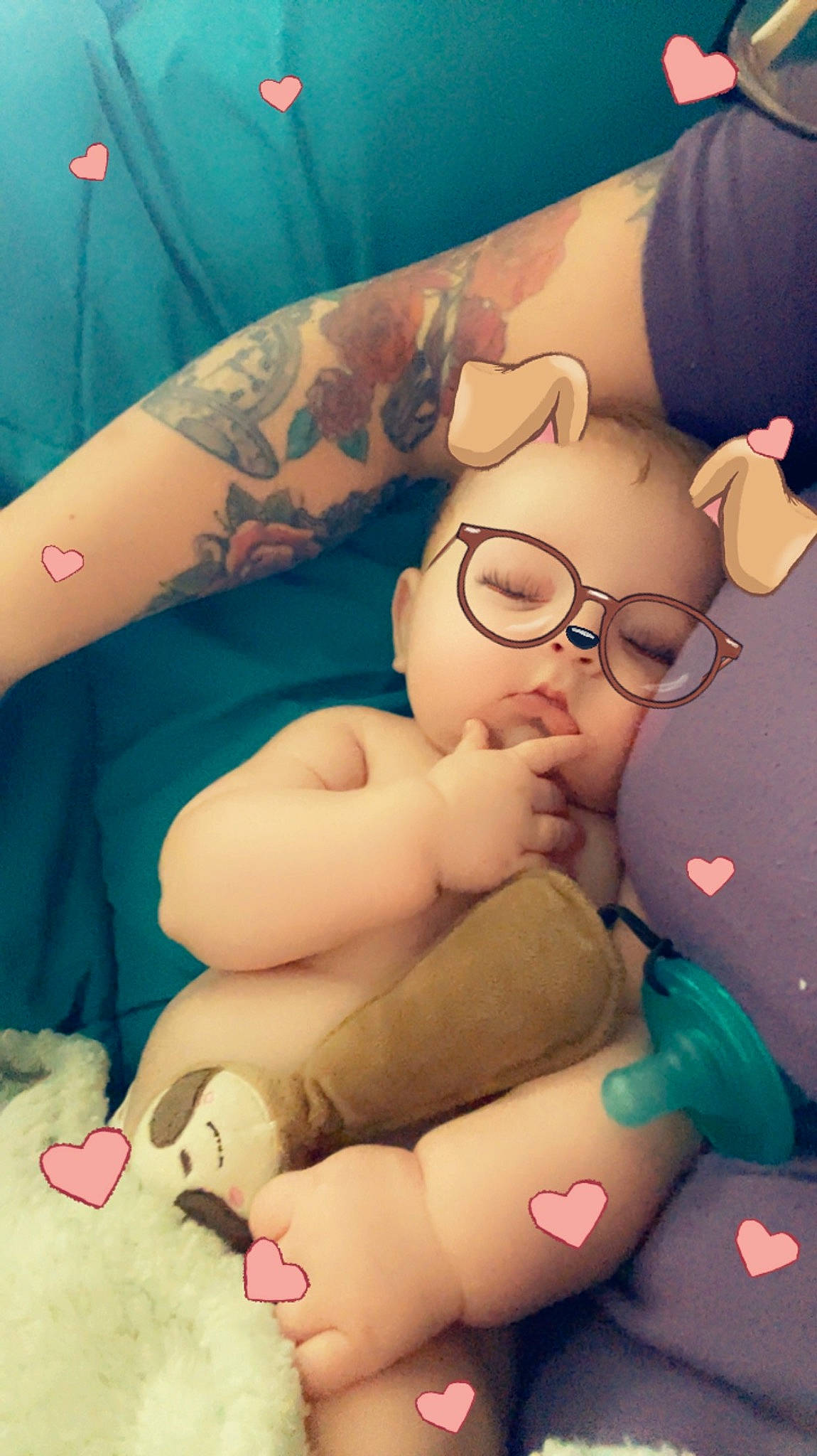 Rylan is registered to the contest to win money with this photo: arm, cartoon, chest, comfort, eyewear, finger, fun, gesture, glasses, hand, happy, head, human_body, mouth, person, pink, skin, thigh, thumb, toy