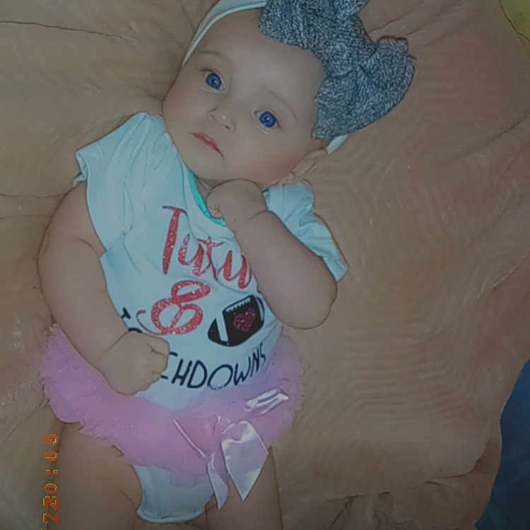 Ryder joined the competition — help win amazing prizes! arm, baby, bodypart, bonnet, cap, clothing, diaper, face, finger, glove, hand, hat, head, indoors, newborn, person, photography, portrait, sitting, t_shirt