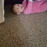 Caroline is registered to the contest to win money with this photo: child, floor, flooring, girl, infant, pink, product, skin, textile, toddler