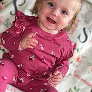 Savannah-Rae joined the competition — help win amazing prizes! toddler, child, smiling, pink_outfit, bows, hair_accessories, mushroom_pattern, berries_pattern, blanket, floral_pattern, sitting, happy, indoors, portrait, cute, playful, baby, clothing, face, hands