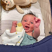May joined the competition — help win amazing prizes! baby, bed, blanket, couch, cradle, crib, cushion, face, furniture, head, homedecor, indoors, infantbed, newborn, person, photography, plush, portrait, teddybear, toy