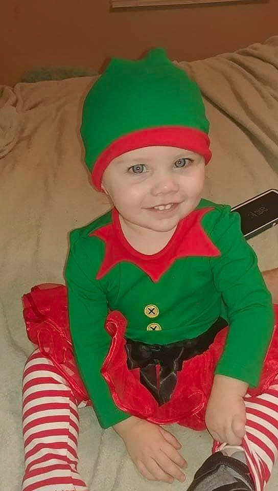 Rachelle is registered to the contest to win money with this photo: baby, child, christmas, fictional_character, headgear, holiday, joy, person, sleeve, toddler