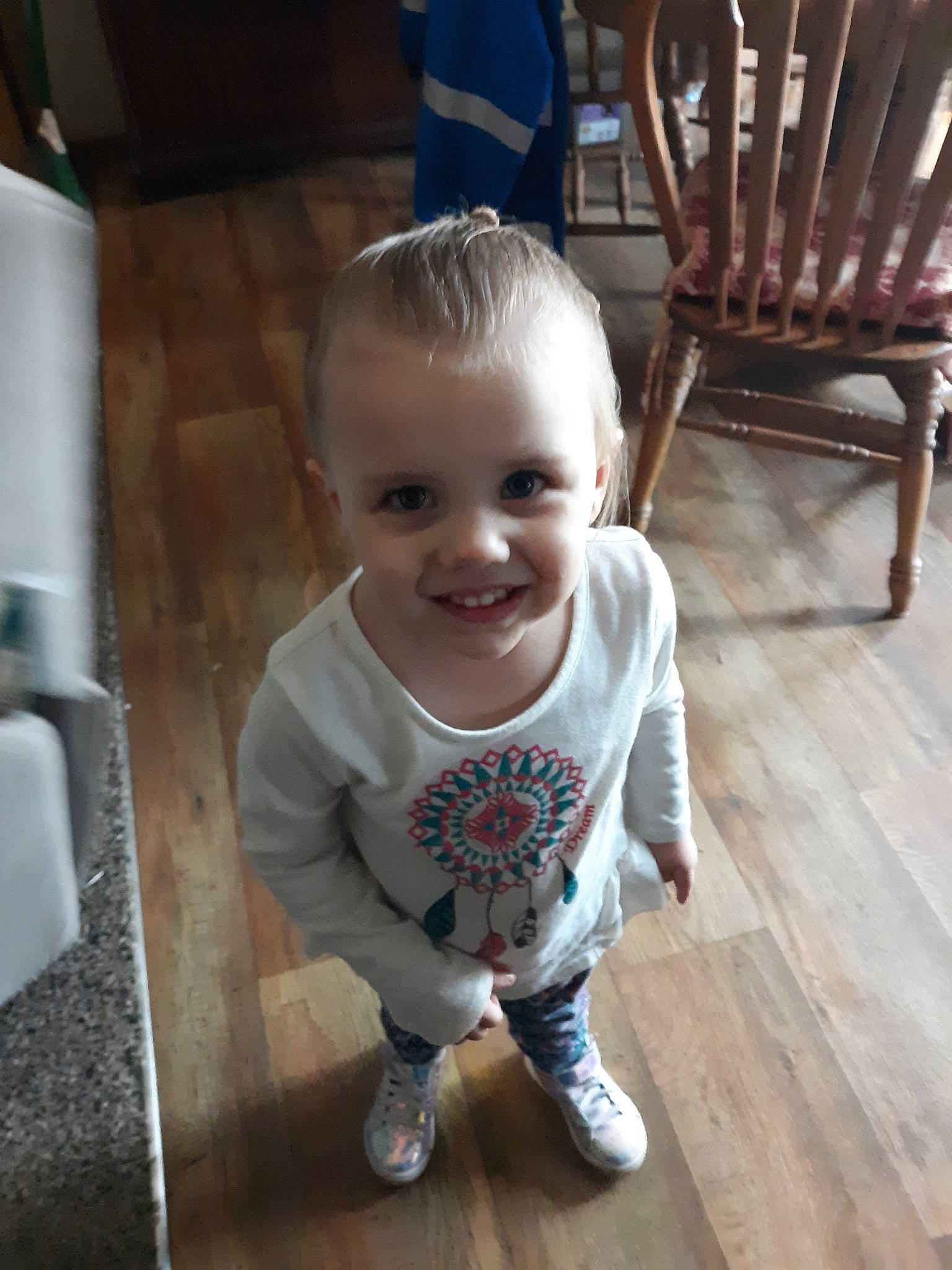 Rachelle is registered to the contest to win money with this photo: baby, baby_toddler_clothing, chair, cheek, child, joy, person, sitting, smile, standing, toddler