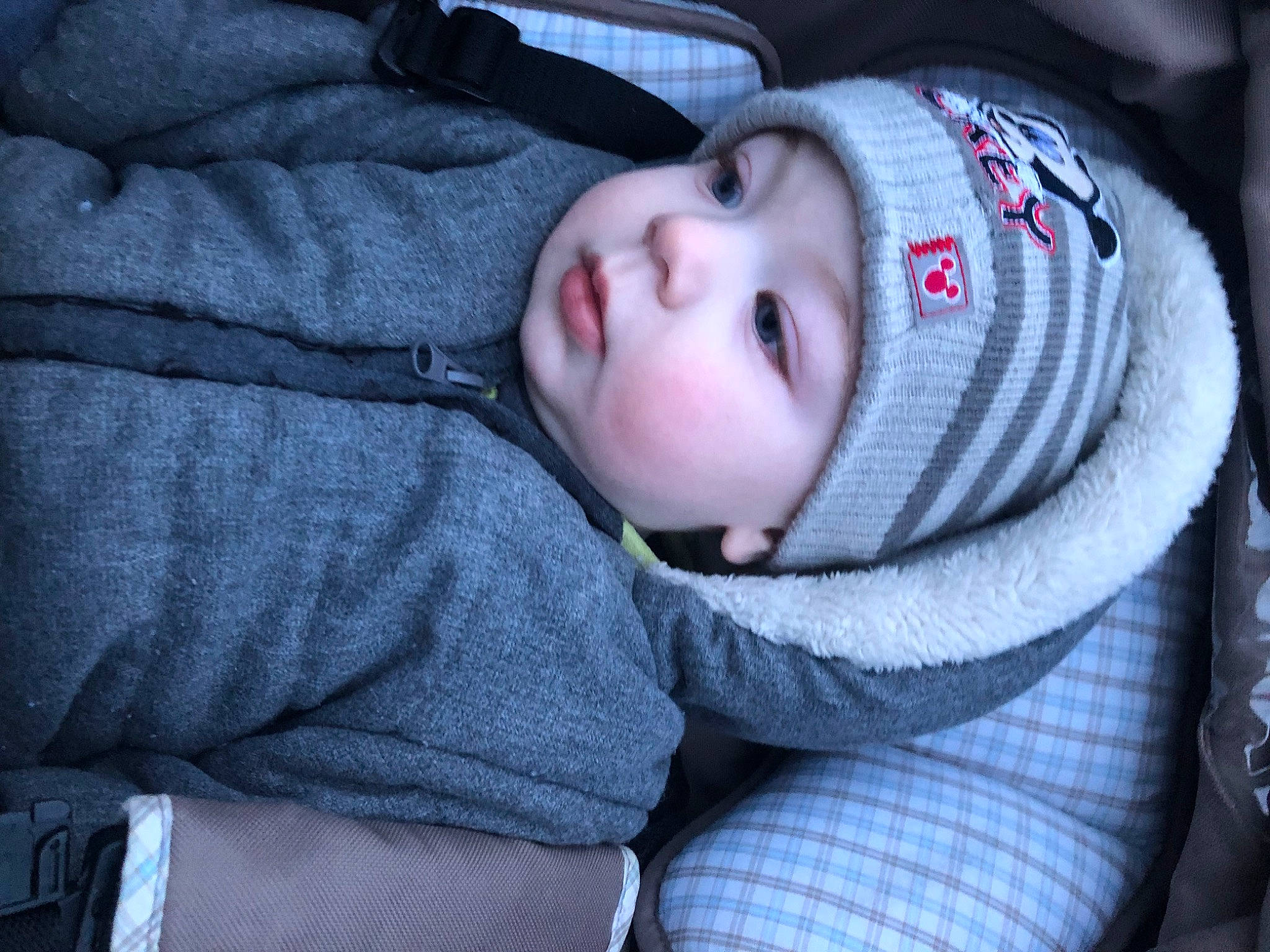 Ayden participe au concours pour gagner de l'argent avec cette photo : baby, baby_products, baby_safety, baby_toddler_clothing, cheek, child, comfort, eye, eyebrow, fur, headwear, iris, knit_cap, lip, nose, pattern, person, sitting, sleeve, toddler