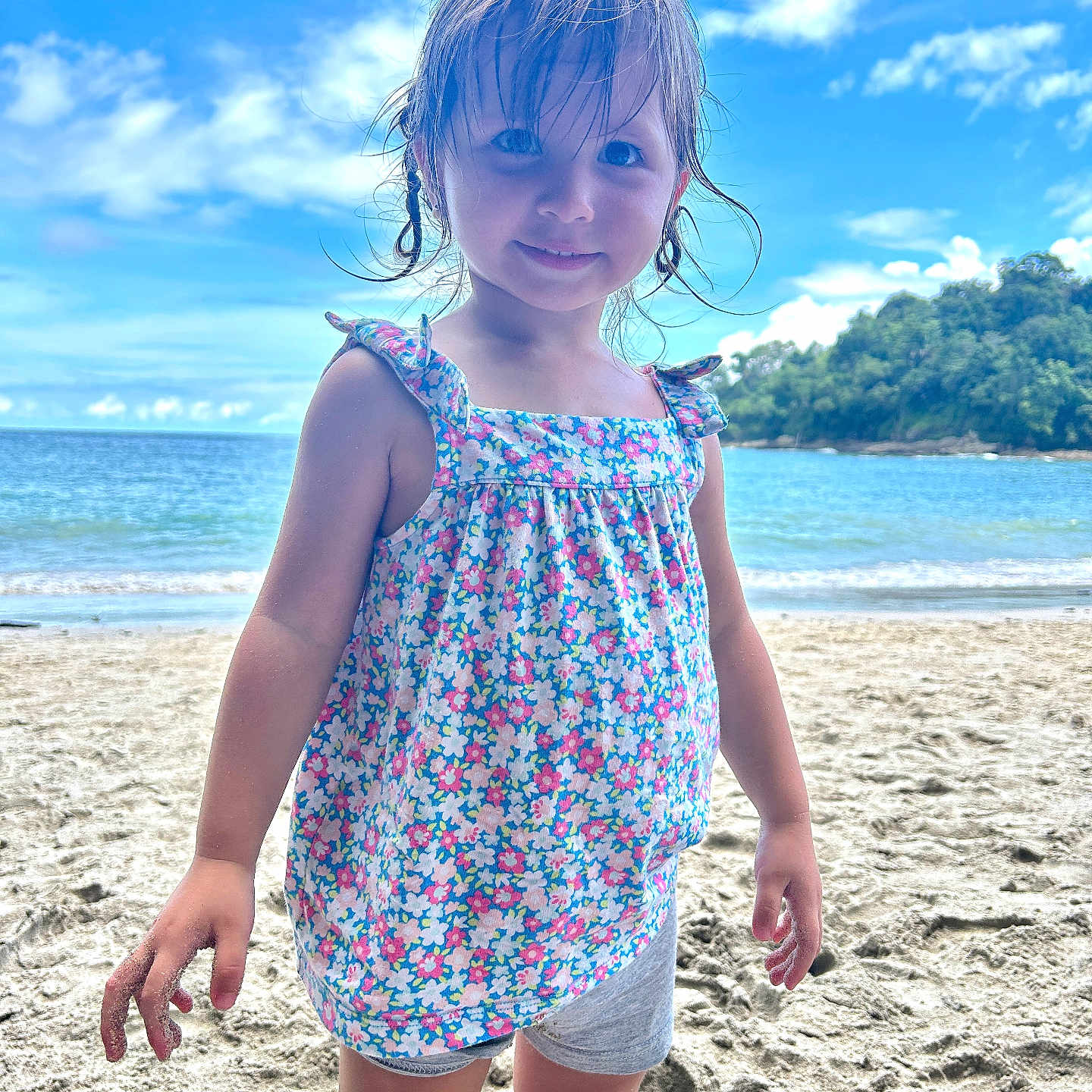 Eliana is registered to the contest to win money with this photo: beach, beachwear, child, clothing, coast, face, female, girl, head, nature, outdoors, person, photography, portrait, sea, shoreline, shorts, summer, swimwear, water