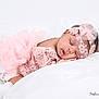 Uhaina Joyaux Mboyo participe au concours pour gagner de l'argent avec cette photo : baby, sleeping, pink, lace, headband, flower, infant, blanket, soft, cute, peaceful, portrait, newborn, cozy, resting, child, delicate, tulle, fabric, sleep