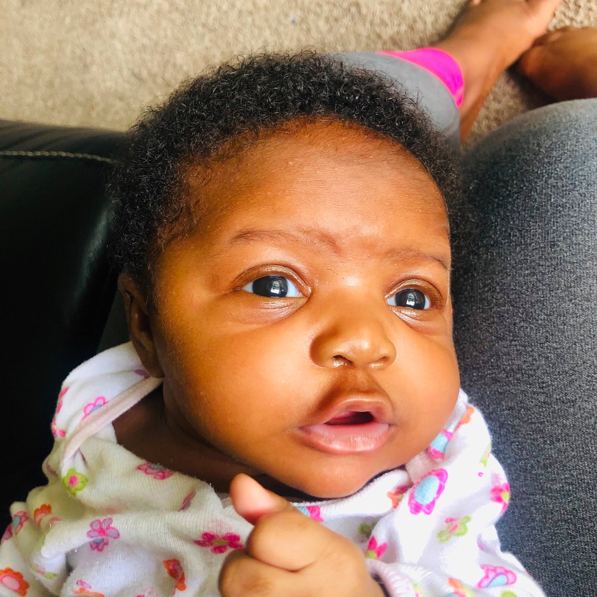 Legacie is registered to the contest to win money with this photo: baby, beauty, black_hair, cheek, child, chin, eye, eyebrow, face, finger, forehead, hair, head, human, lip, mouth, nose, person, pink, skin