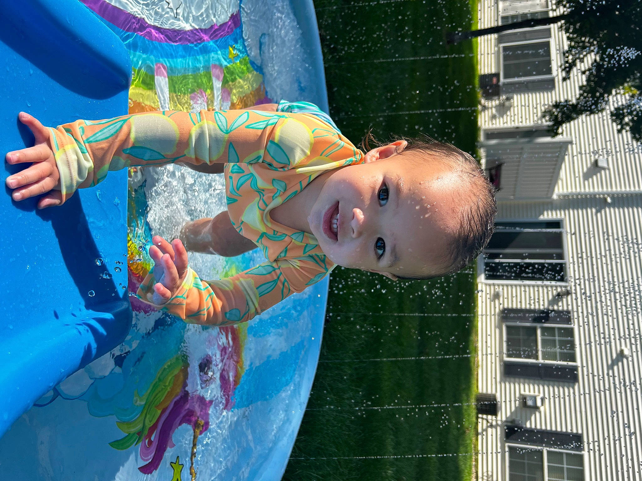 Amiyah is registered to the contest to win money with this photo: art, child, chute, city, event, fun, grass, happy, leisure, pattern, person, play, recreation, smile, toddler, tree, vacation, visual_arts, water, window