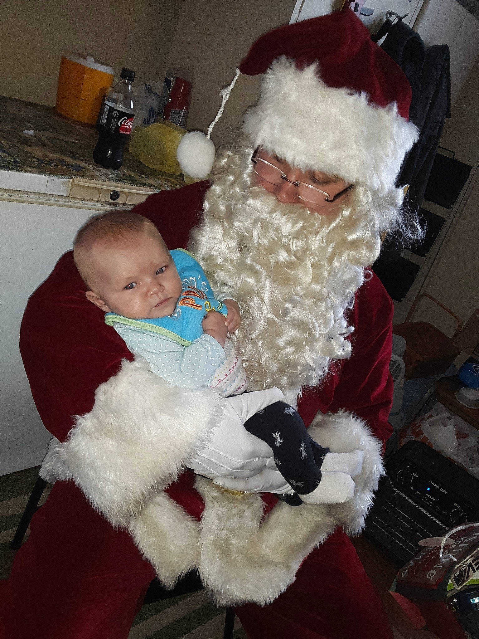 Haleigh is registered to the contest to win money with this photo: beard, child, christmas, christmas_eve, facial_hair, fictional_character, fur, holiday, human_body, lap, person, santa_claus, toddler