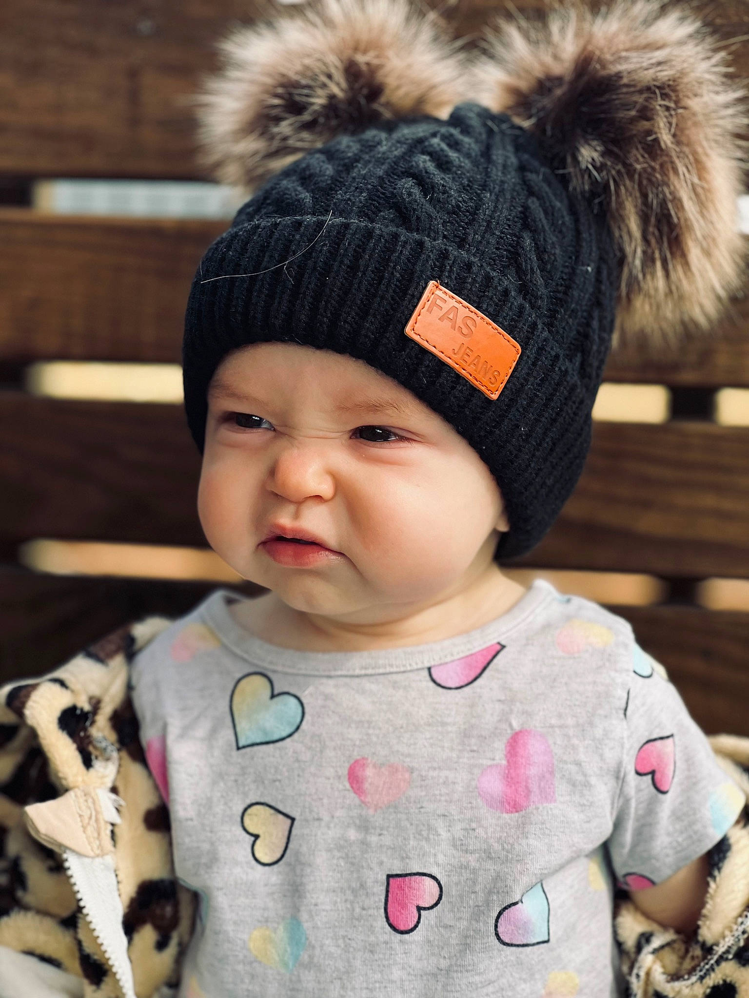 Alizabeth is registered to the contest to win money with this photo: baby, baby_toddler_clothing, cap, cheek, child, clothing, eye, face, facial_expression, fashion_accessory, happy, head, headwear, knit_cap, lip, organ, outerwear, person, photograph, skin