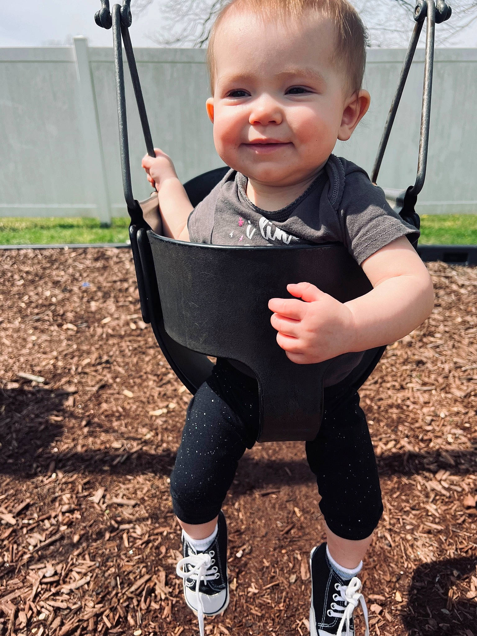 Alizabeth joined the competition — help win amazing prizes! baby, baby_toddler_clothing, blond, child, electric_blue, eye, face, facial_expression, fun, grass, hairstyle, happy, head, joy, leisure, person, photograph, sleeve, smile, swing