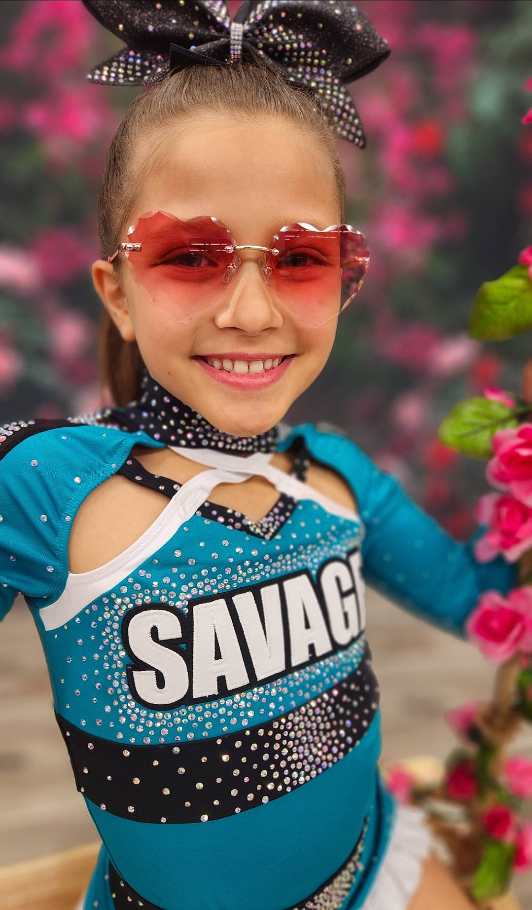 Annie is registered to the contest to win money with this photo: beauty, child, cool, electric_blue, eyewear, face, fun, glasses, goggles, hair, hairstyle, happy, head, human, joy, magenta, organ, person, pink, smile