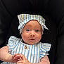baby, infant, child, person, blue_striped_clothing, headband, cute, portrait, hands, face, eyes, expression, sitting, black_background, soft_light, newborn, adorable, skin, small_hands, clothing