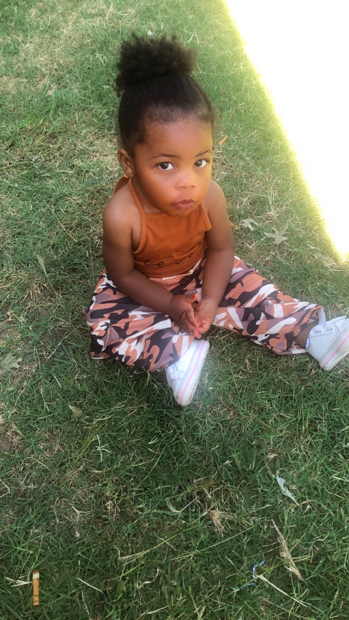 Kamiyah joined the competition — help win amazing prizes! baby, baby_toddler_clothing, face, flash_photography, foot, fun, grass, grass_family, grassland, hand, happy, human_leg, lawn, leaf, meadow, people_in_nature, person, plant, sitting, toddler