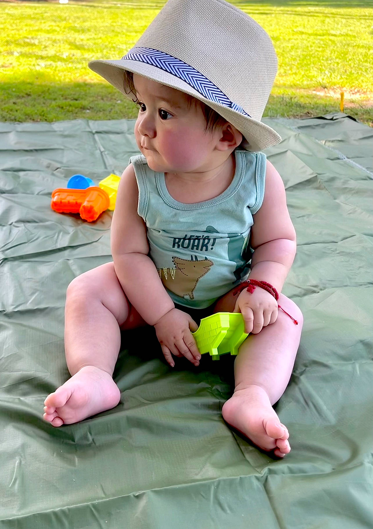 Aziel is registered to the contest to win money with this photo: baby, baby_toddler_clothing, cap, child, face, facial_expression, fun, grass, happy, hat, headwear, leisure, people, people_in_nature, person, photograph, pink, skin, snapshot, summer