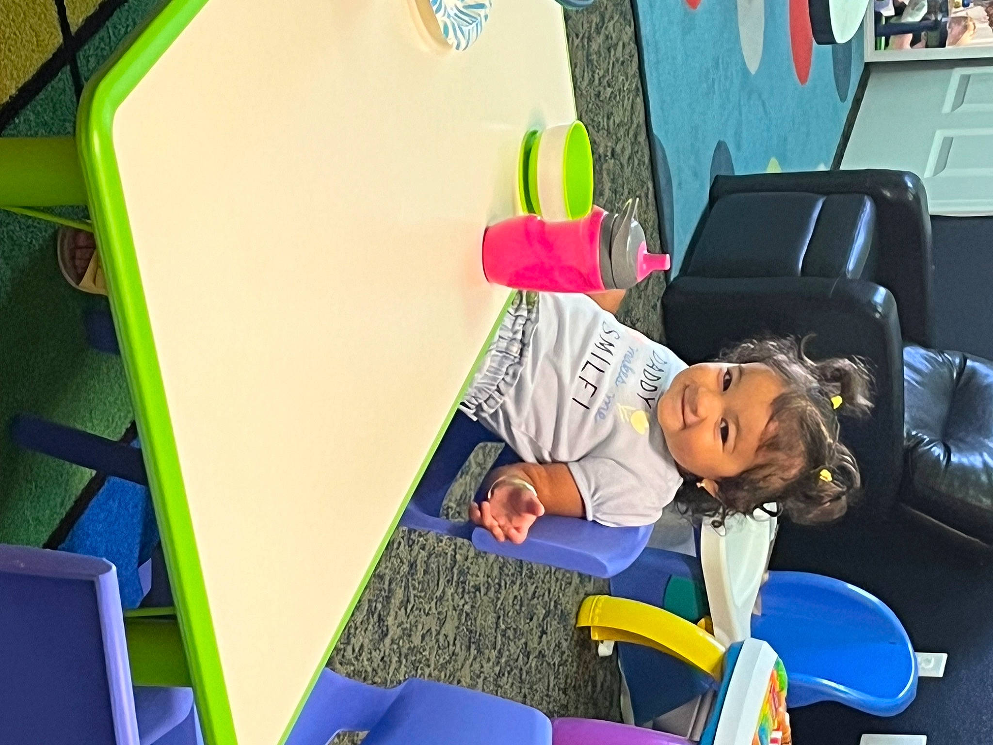 Ava Rose is registered to the contest to win money with this photo: animation, chair, child, flooring, fun, house, joy, leisure, magenta, paper_product, person, play, room, sitting, snapshot, t_shirt, toddler, visual_arts