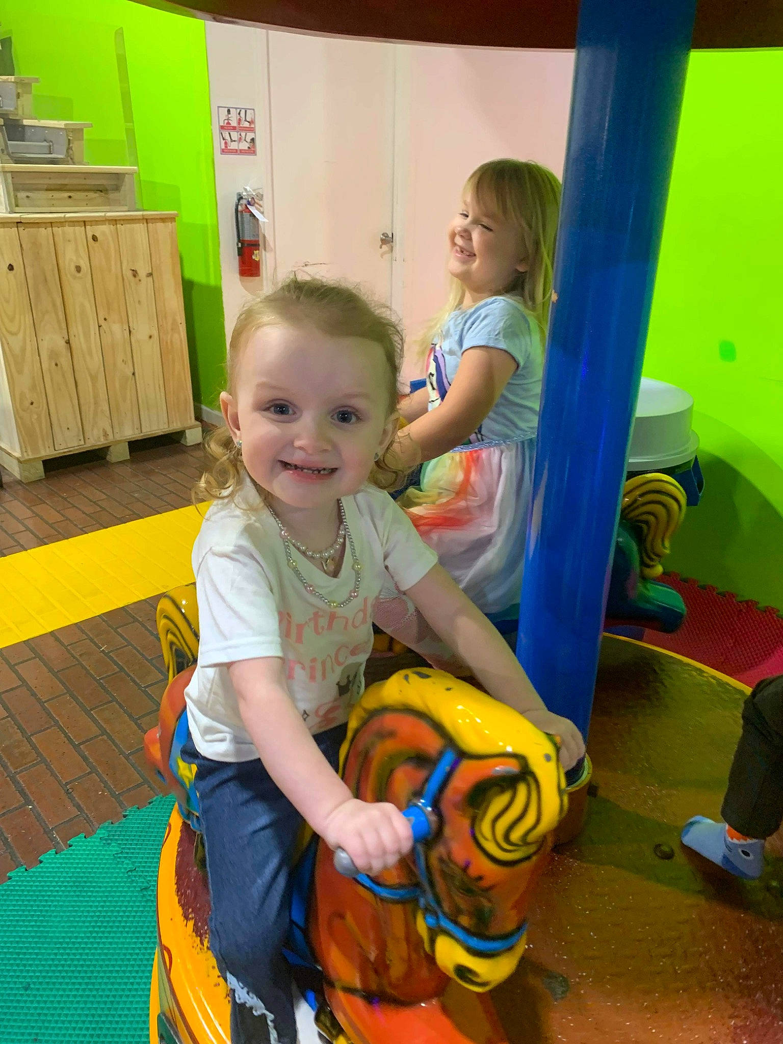 Rayela joined the competition — help win amazing prizes! cabinetry, chest_of_drawers, child, drawer, event, flooring, fun, happy, joy, kindergarten, leisure, person, photograph, play, recreation, refrigerator, room, sitting, smile, snapshot