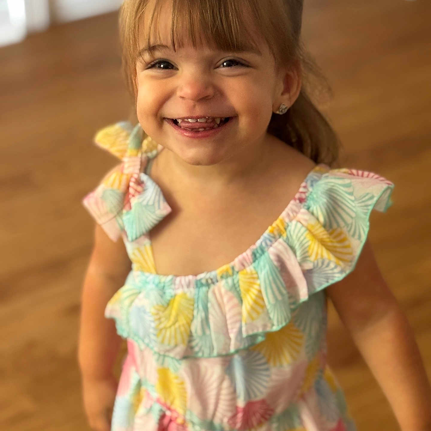 Makayla joined the competition — help win amazing prizes! accessories, blouse, bodypart, child, clothing, dress, face, female, girl, happy, hardwood, head, laughing, mouth, person, photography, portrait, smile, teeth, wood