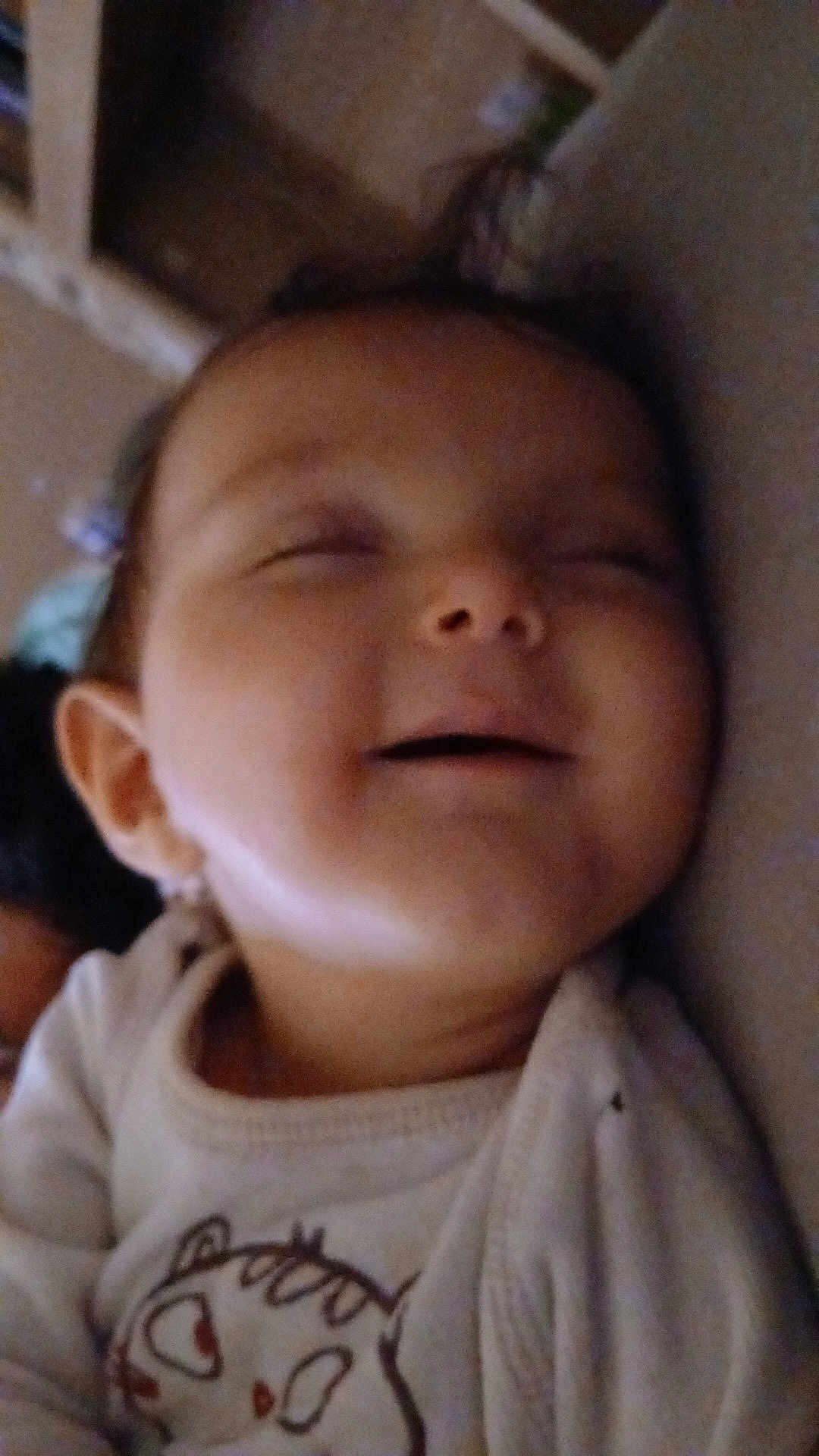 Kaylon participe au concours pour gagner de l'argent avec cette photo : baby, sleeping, smile, close_up, infant, face, cozy, soft, cute, animal_print, clothing, peaceful, portrait, child, young, indoor, relaxing, happy, head, eyes_closed