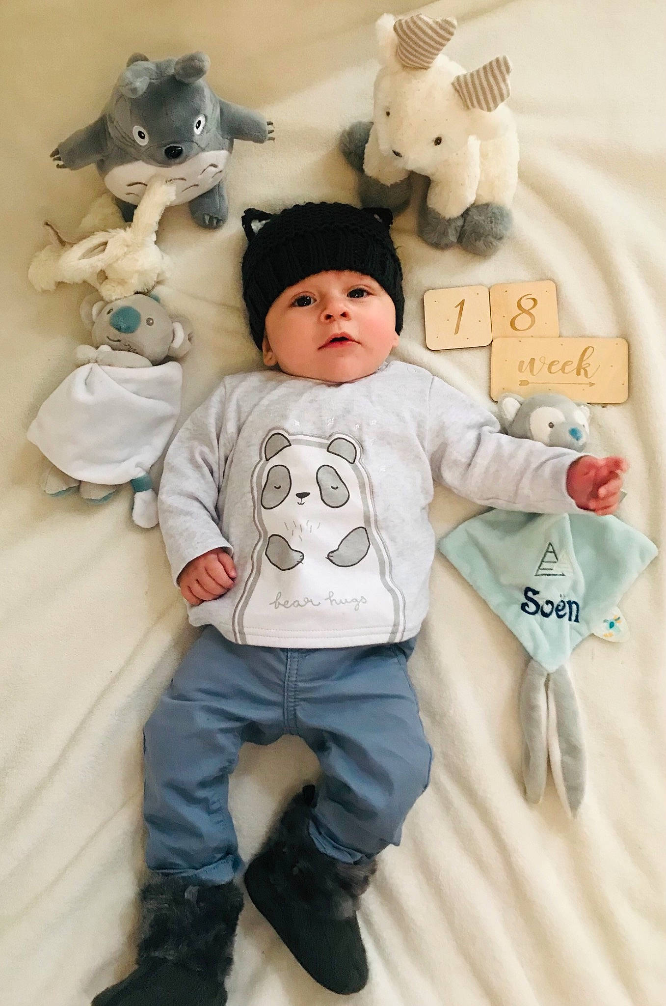 Soën participe au concours pour gagner de l'argent avec cette photo : baby, baby_toddler_clothing, cheek, child, font, fun, fur, happy, headwear, linens, mammal, person, pink, product, room, sleeve, t_shirt, textile, toddler, toy