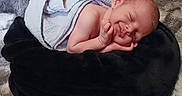 Atreyu joined the competition — help win amazing prizes! baby, blanket, child, comfortable, cozy, cushion, cute, face, indoors, infant, lying_down, newborn, peaceful, plush, portrait, resting, skin, sleeping, soft, wrapped